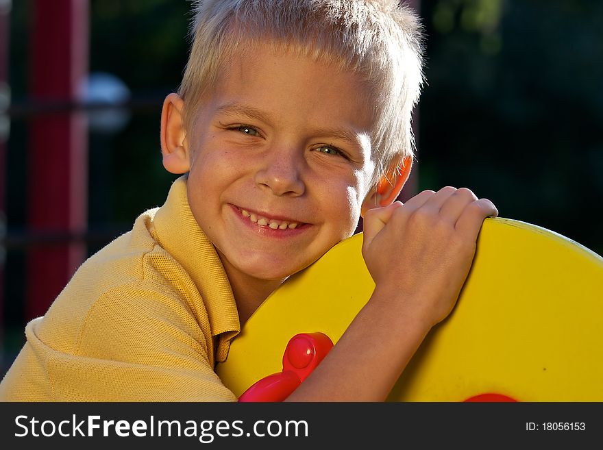 Portrait of smiling little boy - looking at camera