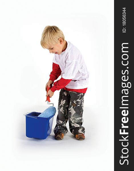 Little dirty worker with paint roller and blue pail  isolated on white. Little dirty worker with paint roller and blue pail  isolated on white