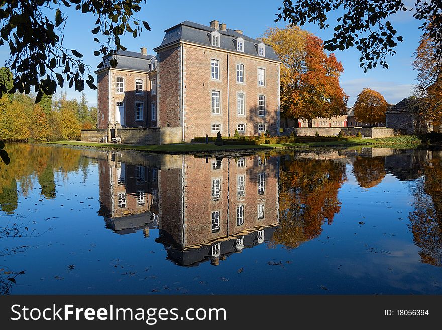 The reflection of castle cortenbach in the pond. The reflection of castle cortenbach in the pond