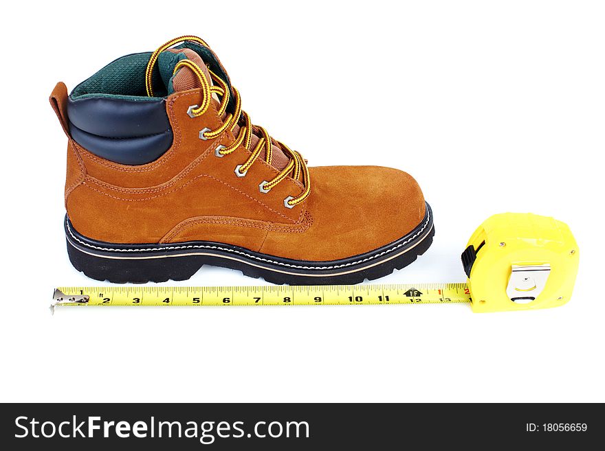 Boot and tape-measure on a white background