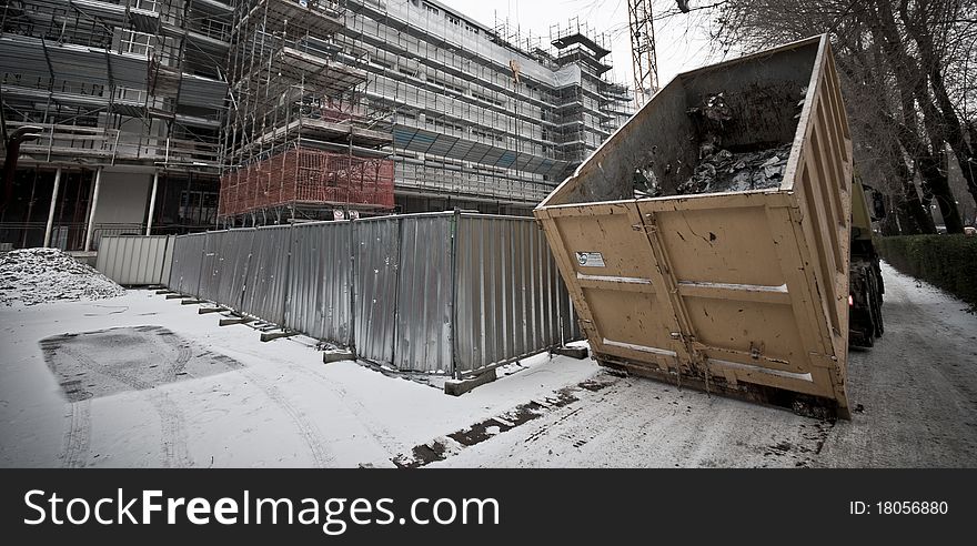 Truck in the yard in snowy landscape