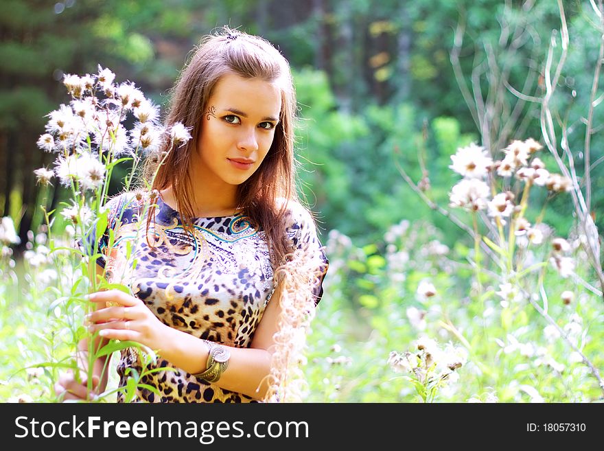 An attractive girl on the nature