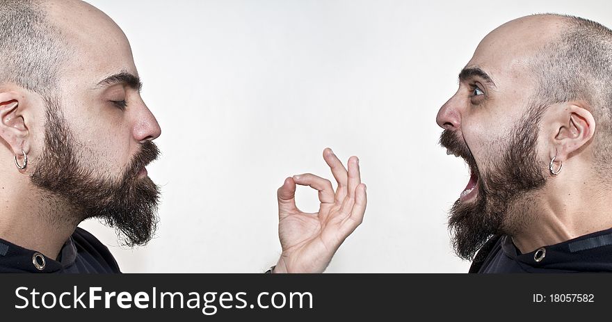 Man with beard in meditation and man yelling on white background