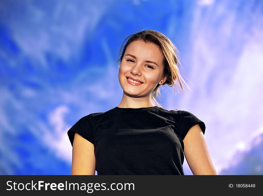 Romantic  girl with the  sky over background