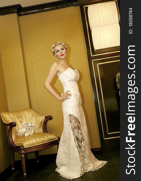 Beauty young bride dressed in elegance white wedding dress. Beauty young bride dressed in elegance white wedding dress