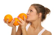 Young Woman With Three Oranges Stock Images Young Woman With Three Oranges Stock Images