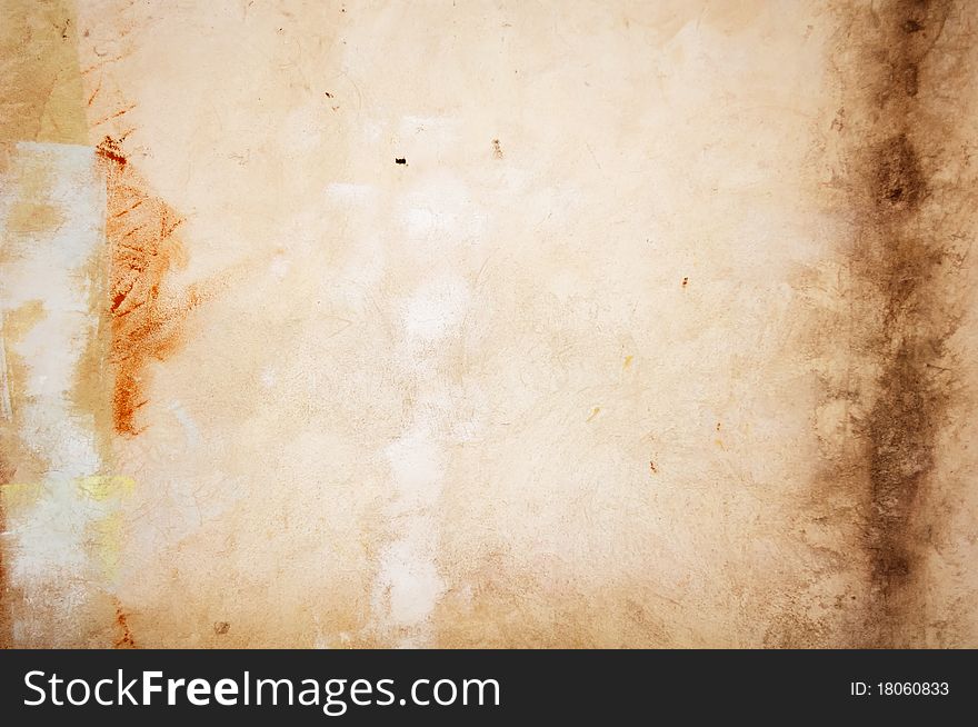 A grungy concrete wall as a background. A grungy concrete wall as a background