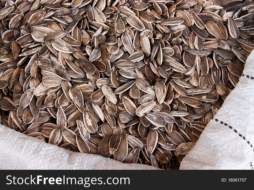 Sunflower seeds in a white sack