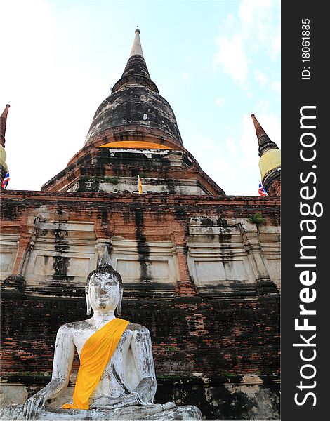 Buddha Statue with Thai ancient city background, Wat Yaichaimongkol, Ayutthaya, Thailand