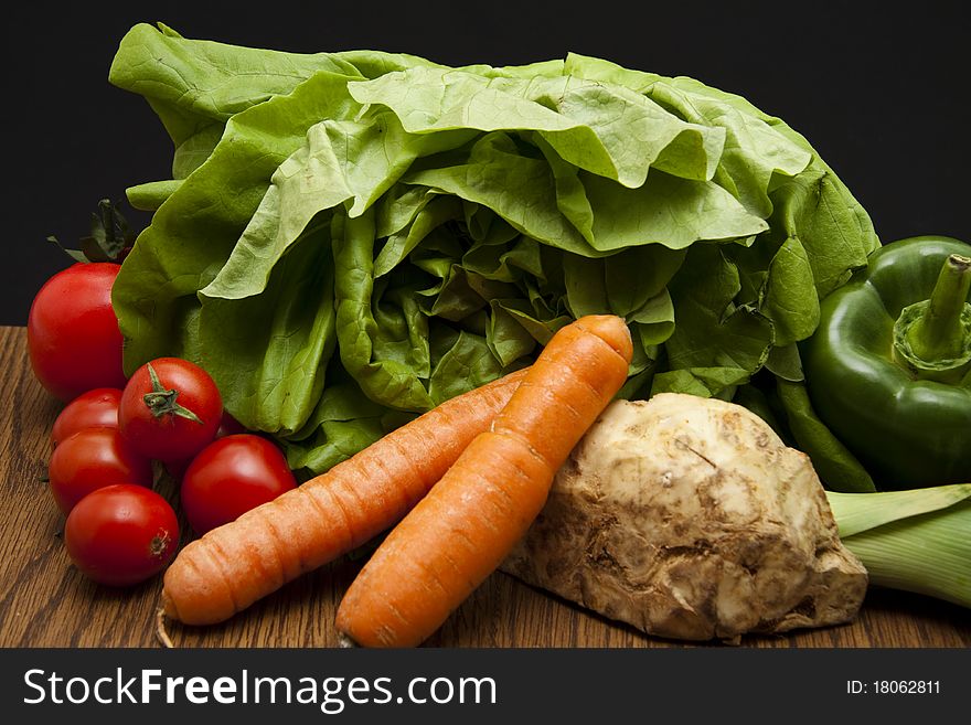 Fresh vegetable onto black background