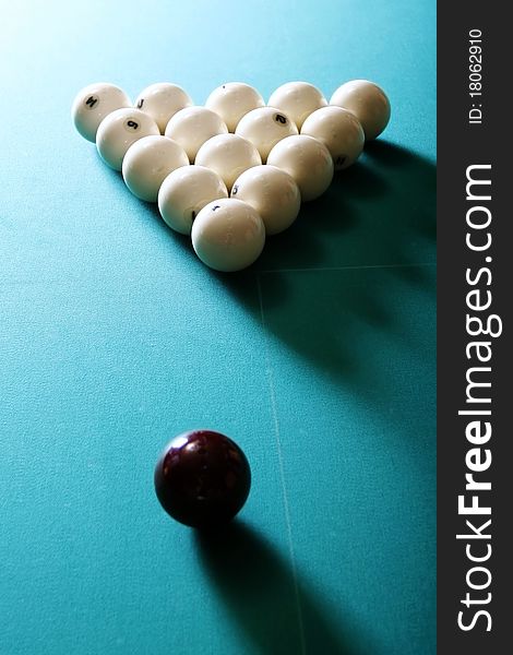 Billiards table with white balls