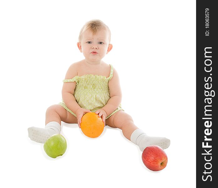 Baby with fruits isolated on white