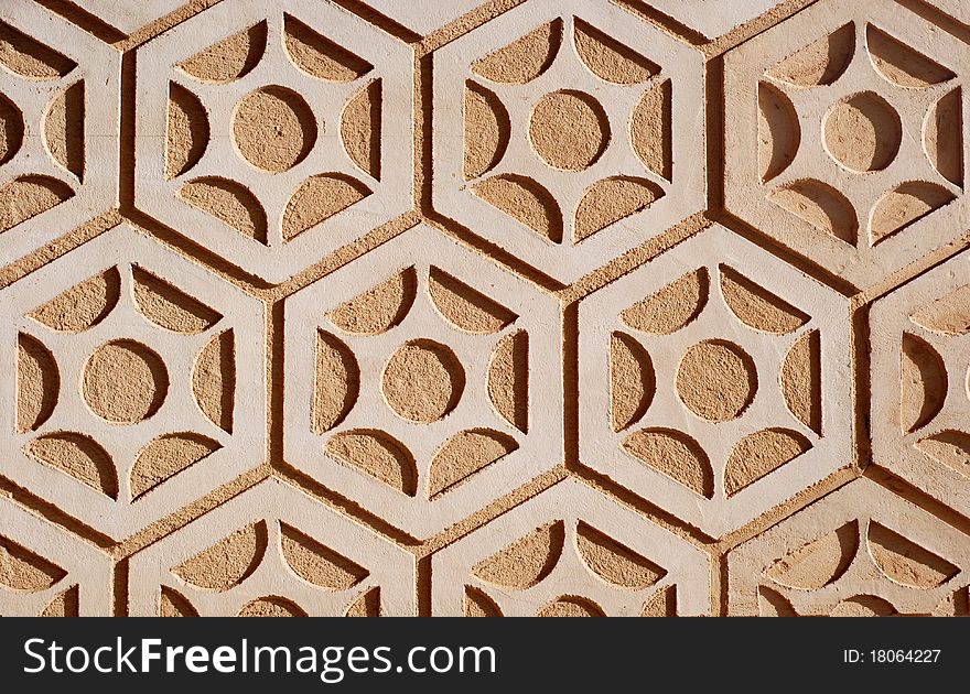 A close-up section of a grouted stone wall or floor. A close-up section of a grouted stone wall or floor