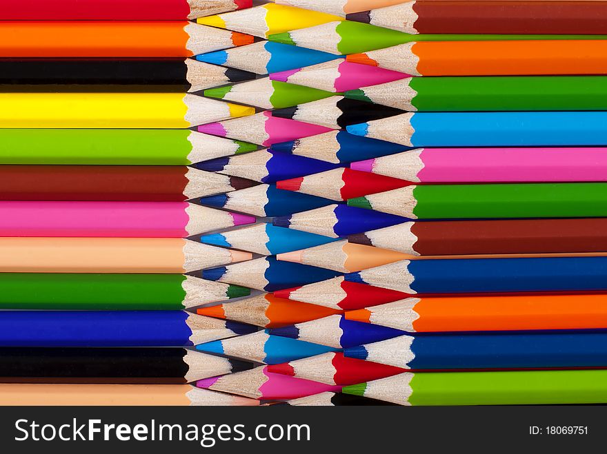 Pencils to draw stacked close to each other, horizontally, and colorful. Pencils to draw stacked close to each other, horizontally, and colorful