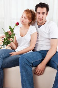 Young Boy And A Beauty Girl With Red Rose Royalty Free Stock Photography
