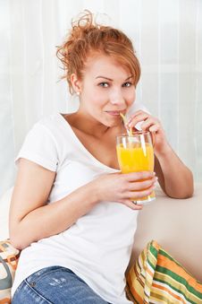 Beauty, Young Girl Drinking A Glass Of Juice Royalty Free Stock Photography