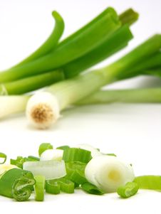 Chopped & Whole Spring Onions Royalty Free Stock Photos