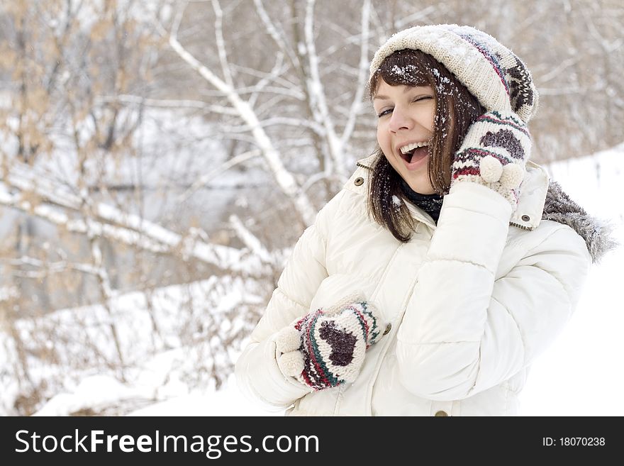 Closeup portrait of a cute girl walking outdoor in winter