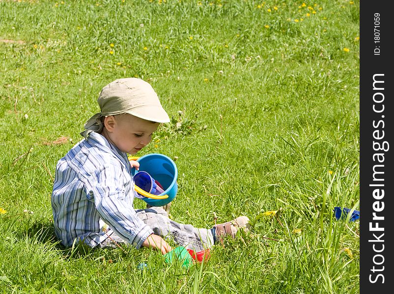 2 years old boy playing in park