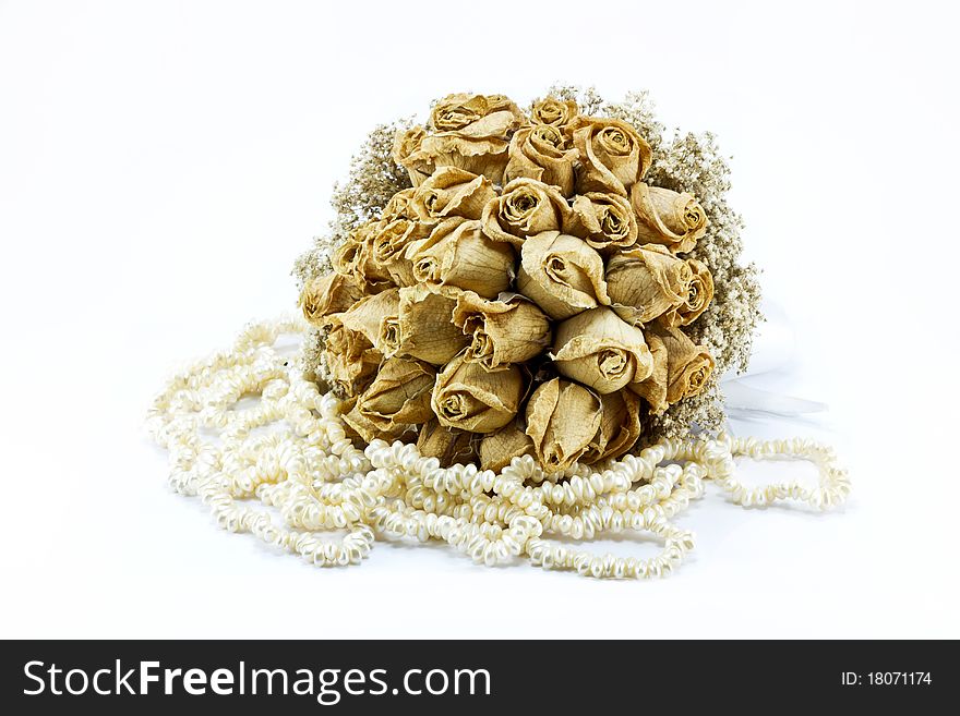 Dried roses bouquet isolated on white background