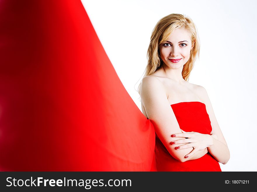 Red, beautiful blonde in a red dress