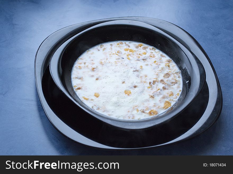 Plate of muesli with milk