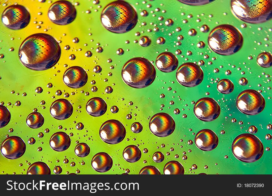 High resolution photo of water-drops on green