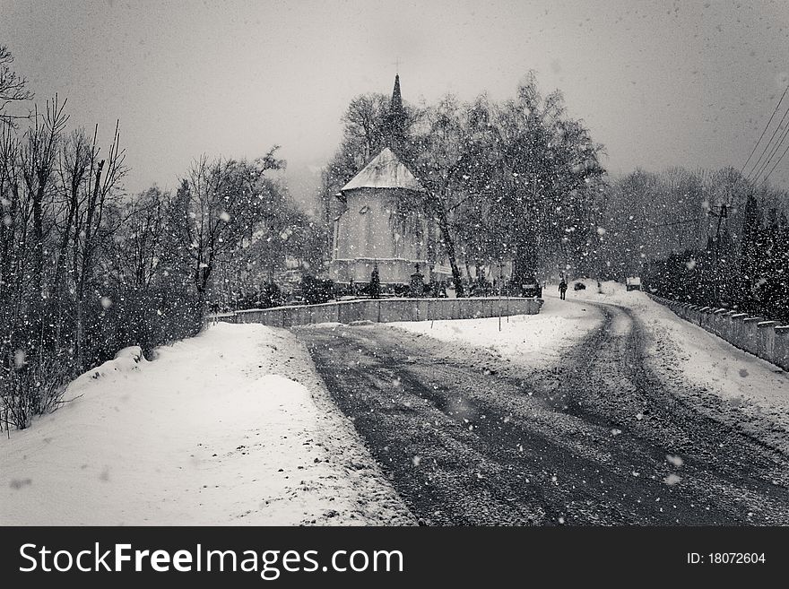 Chapel and road in winter scenery