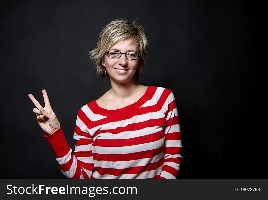 Woman Portrait Showing Victory Sign