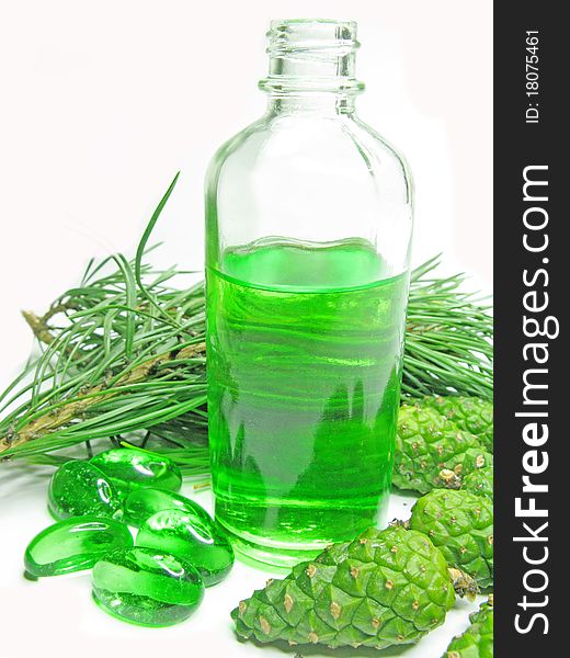 Spa green oil bottle with fir natural coniferous extract. Spa green oil bottle with fir natural coniferous extract