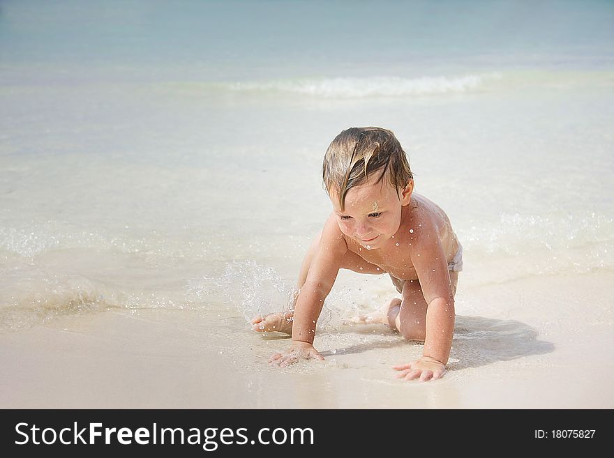 Cute child playing on beach. Cute child playing on beach