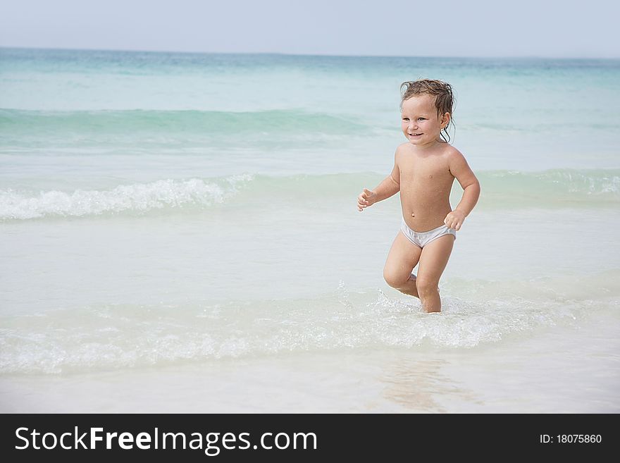 Cute child playing on beach. Cute child playing on beach