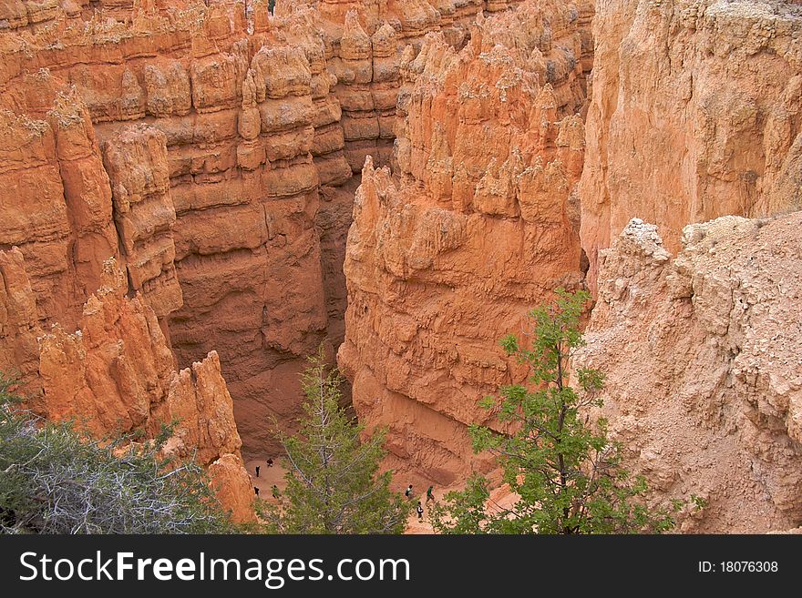 Hikers on the bottom of a trail in Bryce Canyon National Park