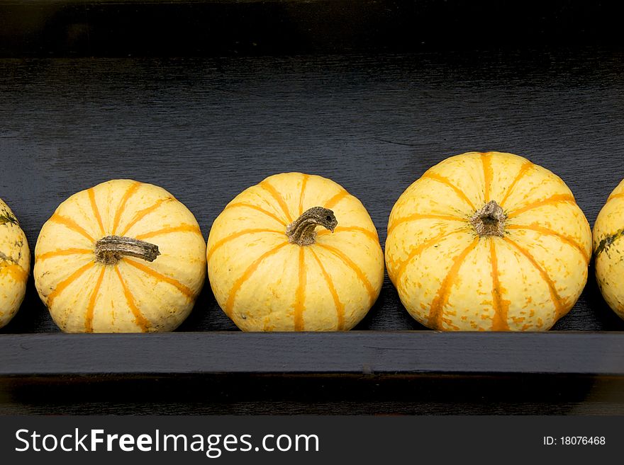 Yellow pumpkins from small to big