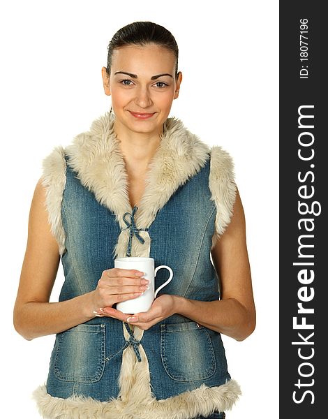 Portrait of female in denim holding tea cup