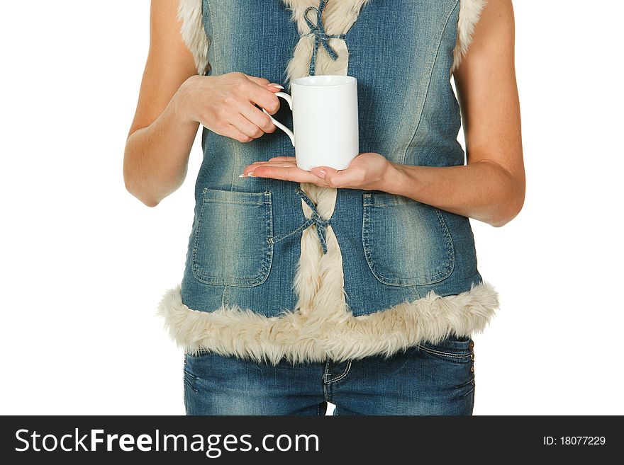 Body of young female holding cup of tea in the hands, copped; isolated on white. Body of young female holding cup of tea in the hands, copped; isolated on white