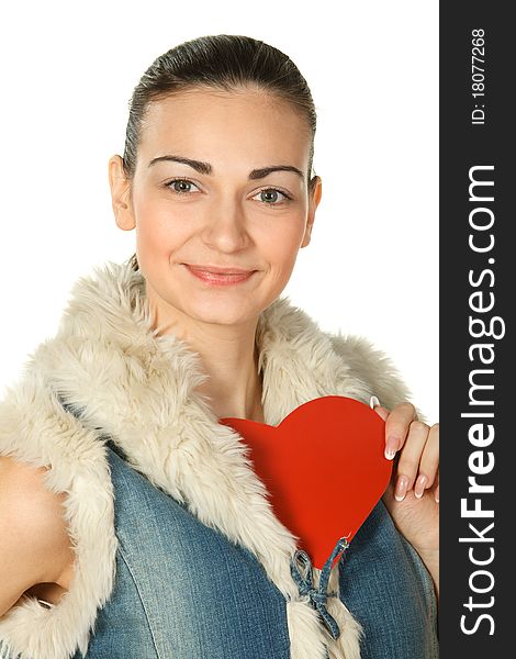 Portrait of young female in blue denim holding heart shape isolated on white. Portrait of young female in blue denim holding heart shape isolated on white