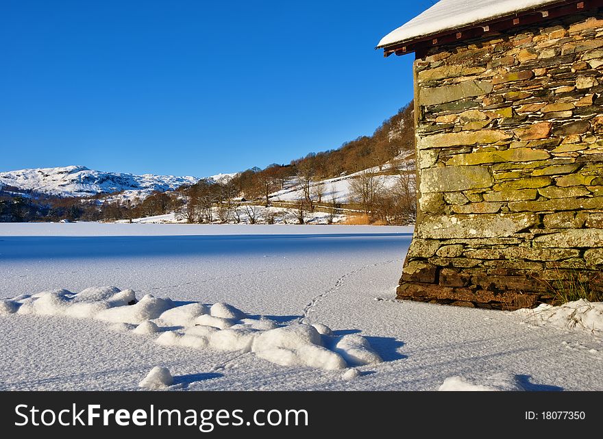A Boathouse on frozen Rydal Water