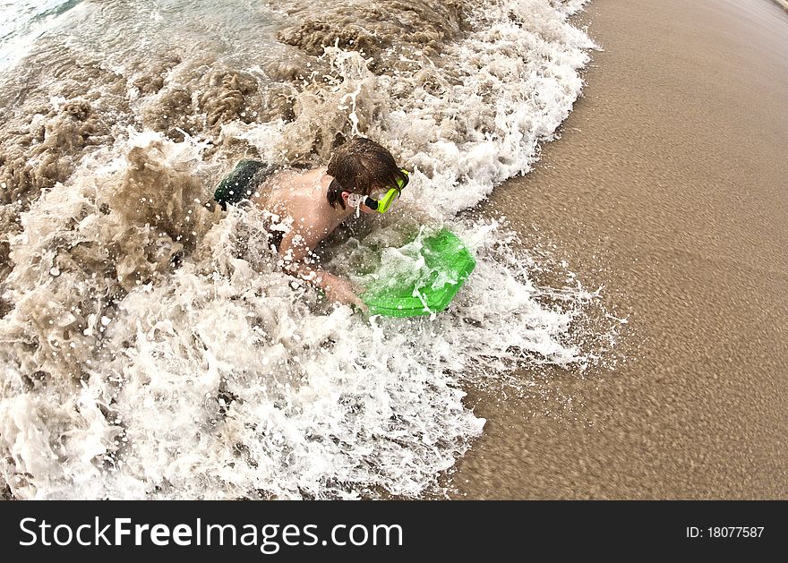 Boy has fun at the beach