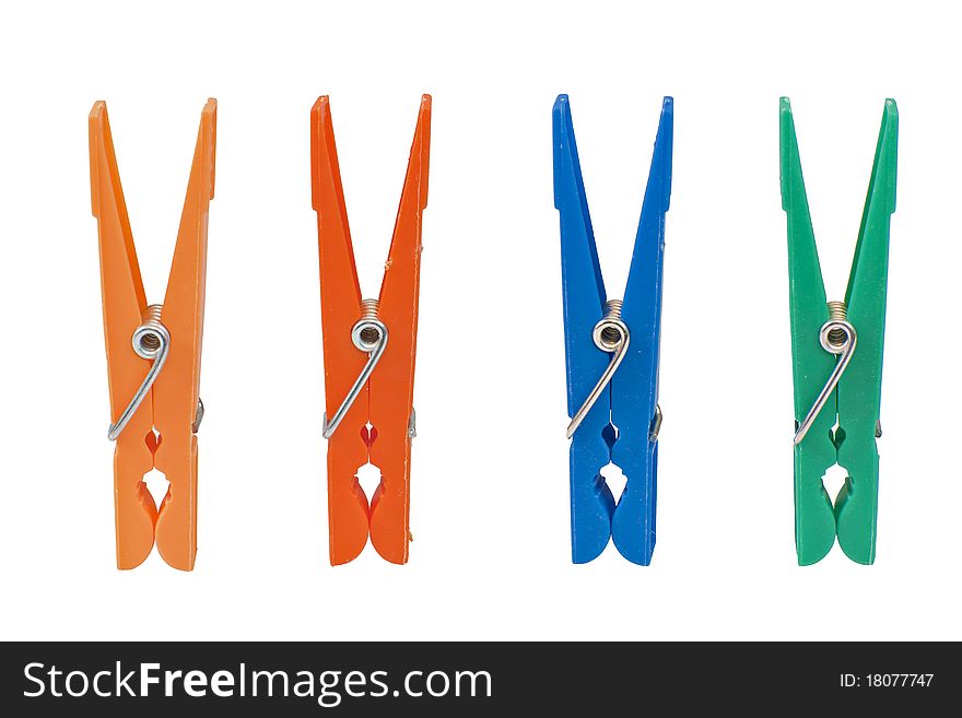 Four colored clothespin isolated on white background