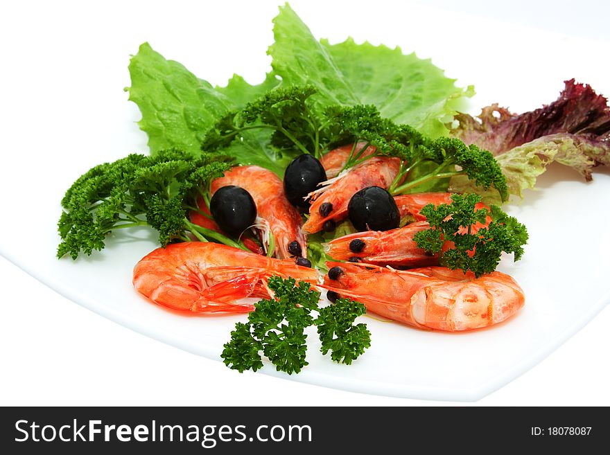 Shrimp with lettuce, parsley and black olives. Shrimp with lettuce, parsley and black olives