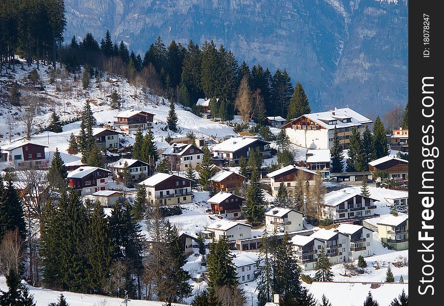 Winter holiday houses in swiss alps