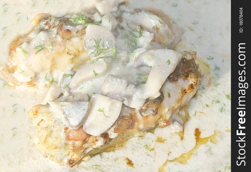 Roll of meat with mushroom sauce