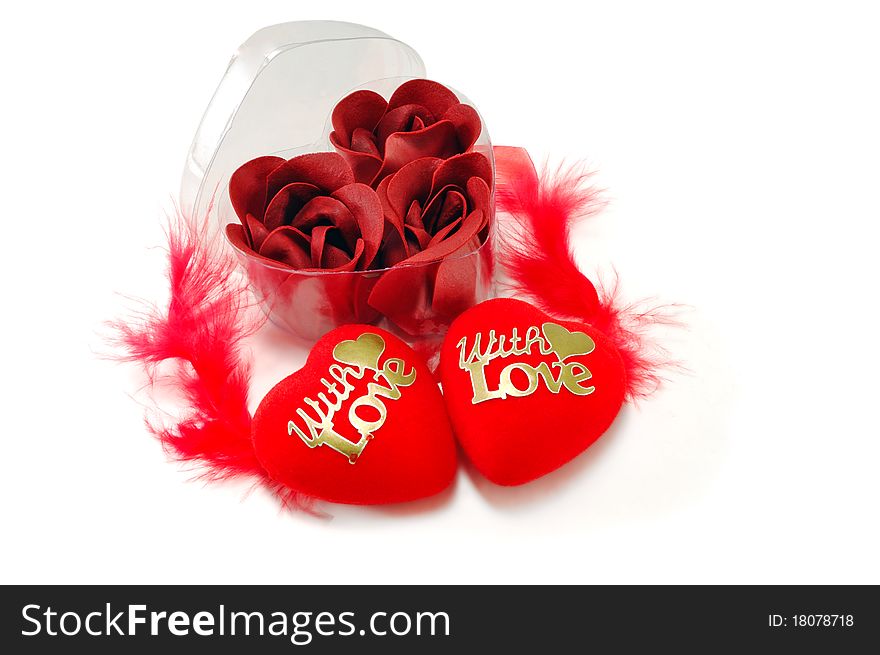 Box with roses and two hearts with feathers. Box with roses and two hearts with feathers