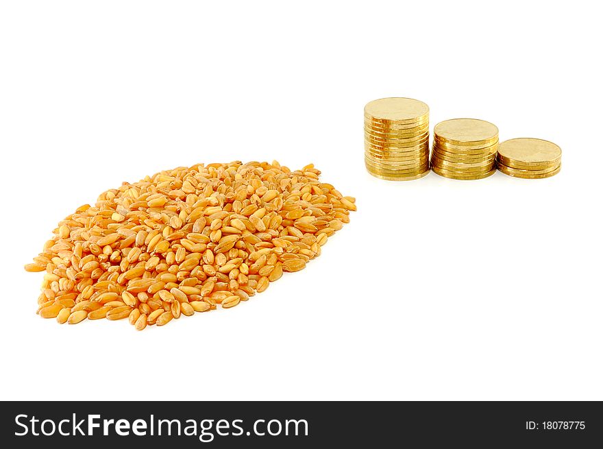 Grain of wheat and metal coins are isolated on a white background