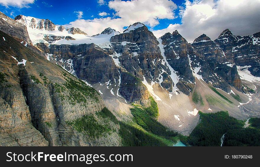 Moraine Lake is a glacially fed lake in Banff National Park, 14 kilometres outside the Village of Lake Louise, Alberta, Canada. It is situated in the Valley of the Ten Peaks, at an elevation of approximately 1,884 metres. The lake has a surface area of 50 hectares. Moraine Lake is a glacially fed lake in Banff National Park, 14 kilometres outside the Village of Lake Louise, Alberta, Canada. It is situated in the Valley of the Ten Peaks, at an elevation of approximately 1,884 metres. The lake has a surface area of 50 hectares.