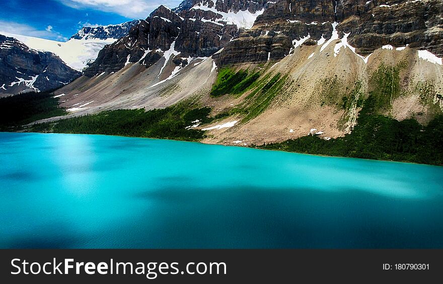 Moraine Lake is a glacially fed lake in Banff National Park, 14 kilometres outside the Village of Lake Louise, Alberta, Canada. It is situated in the Valley of the Ten Peaks, at an elevation of approximately 1,884 metres. The lake has a surface area of 50 hectares. Moraine Lake is a glacially fed lake in Banff National Park, 14 kilometres outside the Village of Lake Louise, Alberta, Canada. It is situated in the Valley of the Ten Peaks, at an elevation of approximately 1,884 metres. The lake has a surface area of 50 hectares.