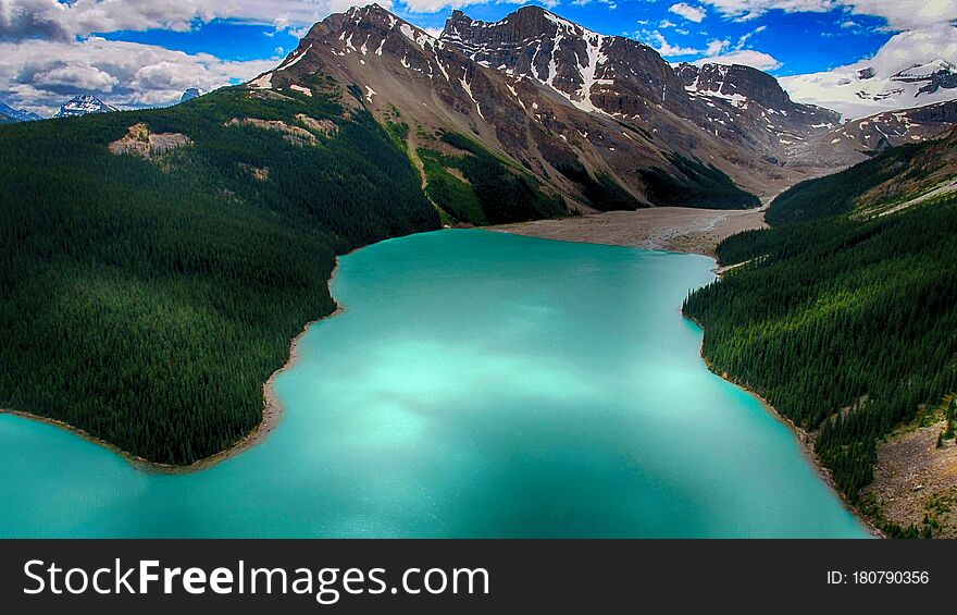 Moraine Lake is a glacially fed lake in Banff National Park, 14 kilometres outside the Village of Lake Louise, Alberta, Canada. It is situated in the Valley of the Ten Peaks, at an elevation of approximately 1,884 metres. The lake has a surface area of 50 hectares. Moraine Lake is a glacially fed lake in Banff National Park, 14 kilometres outside the Village of Lake Louise, Alberta, Canada. It is situated in the Valley of the Ten Peaks, at an elevation of approximately 1,884 metres. The lake has a surface area of 50 hectares.