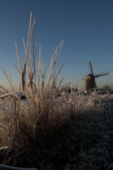 Old Windmill Along Frozen River Royalty Free Stock Photo Old Windmill Along Frozen River Royalty Free Stock Photo