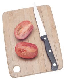 Sliced Roma Tomato On A Wooden Chopping Block Royalty Free Stock Photo Sliced Roma Tomato On A Wooden Chopping Block Royalty Free Stock Photo